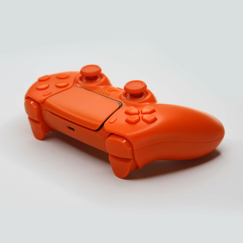 Back left view of Triple Orange PS5 Controller