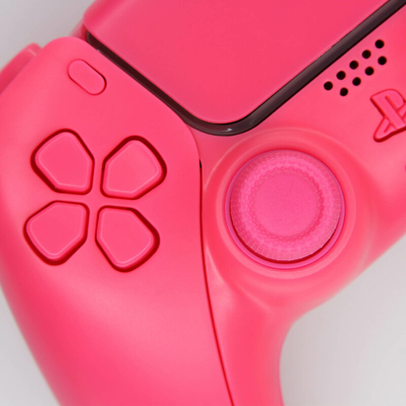 Close up of d-pad on Pink PS5 Controller