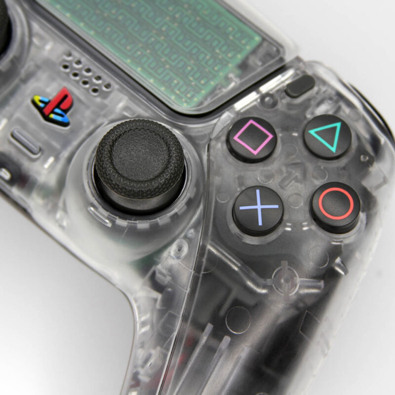Close-up of shape buttons on PS2 Crystal Clear Retro PS5 Controller by Killscreen