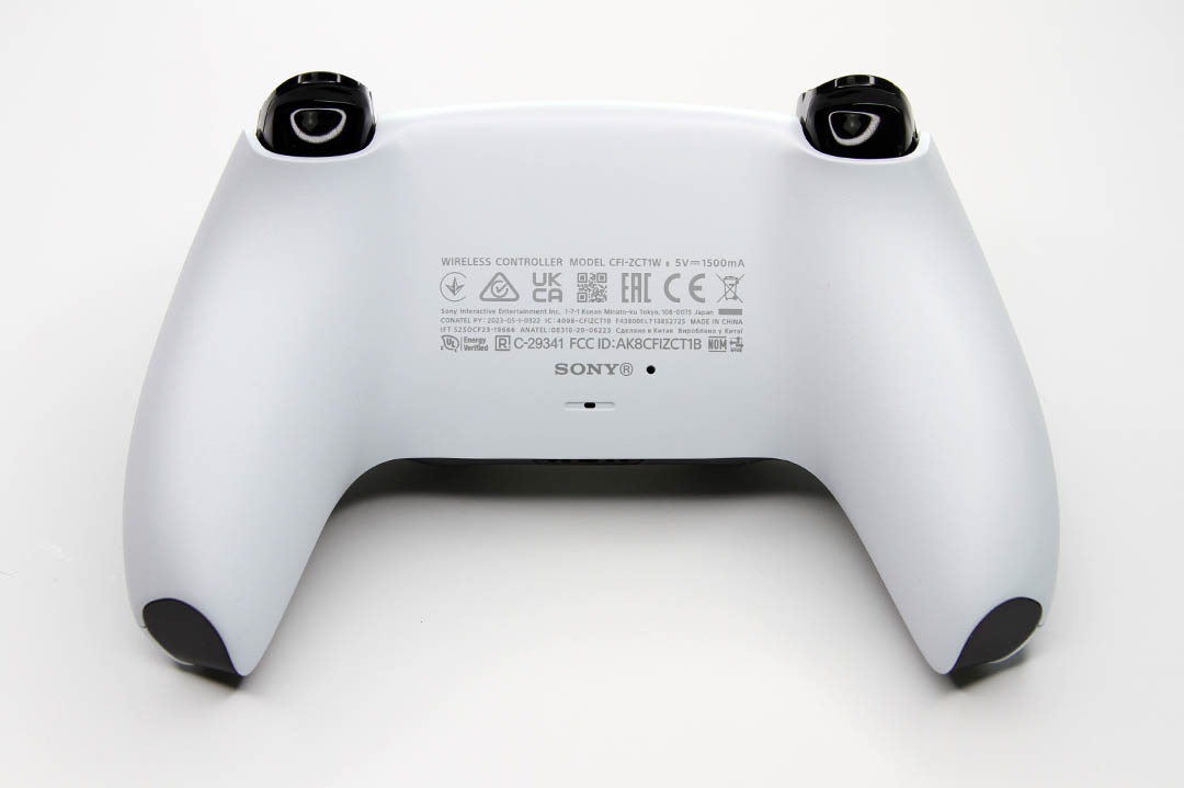 Back of BDM-040 PS5 DualSense Controller showing certification marks and FCC ID