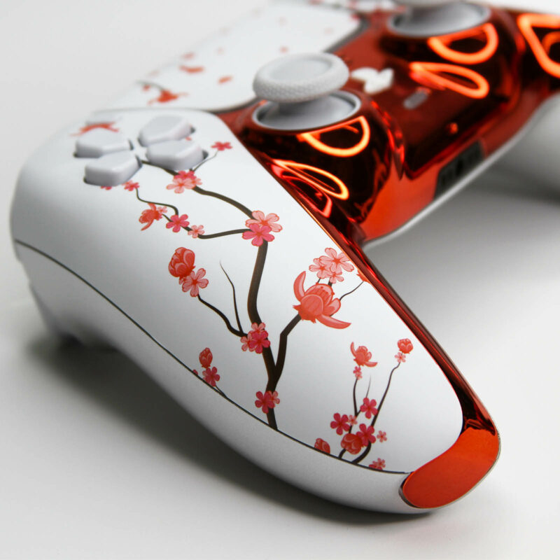 Close up of Cherry Blossom's on Sakura Chrome PS5 DualSense Controller