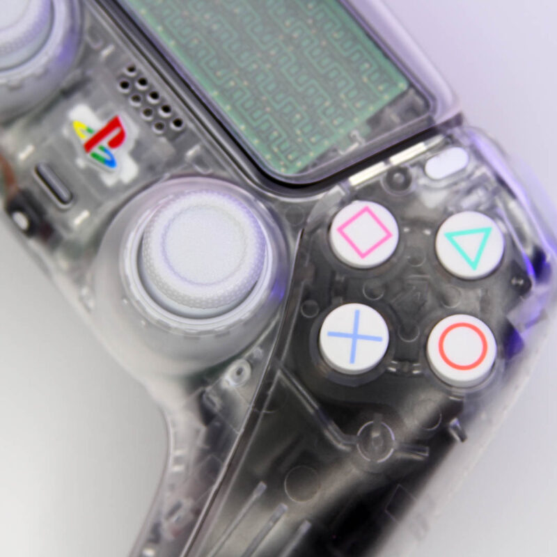 Close up of Clear back shell of Crystal White Clear Retro PS5 DualSense Controller