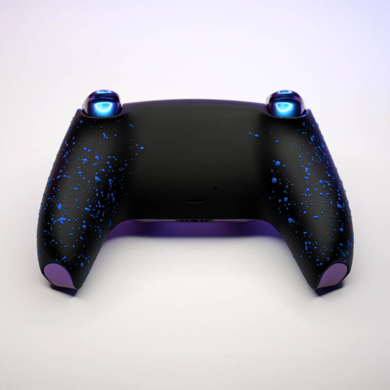 Back shell of controller showing blue splatter on matte black grip