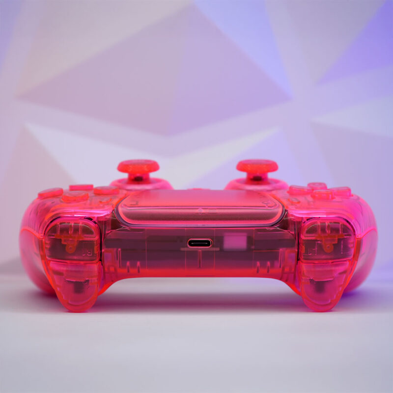 Rear view of the PlayStation 5 DualSense controller with both sticks and buttons clearly visible under the atomic pinkish-orange acrylic style shell