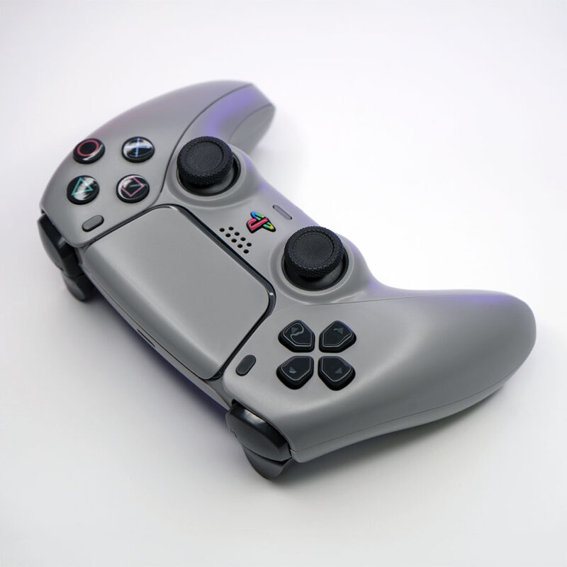 Top angle of 1080-R Authentic Killscreen Original Gray PS5 DualSense 30th Anniversary Controller with Sense style buttons