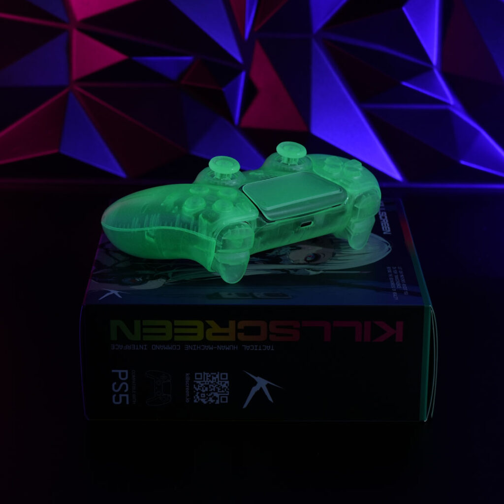 Killscreen GhoulSense™ controller glowing green atop its collector box.